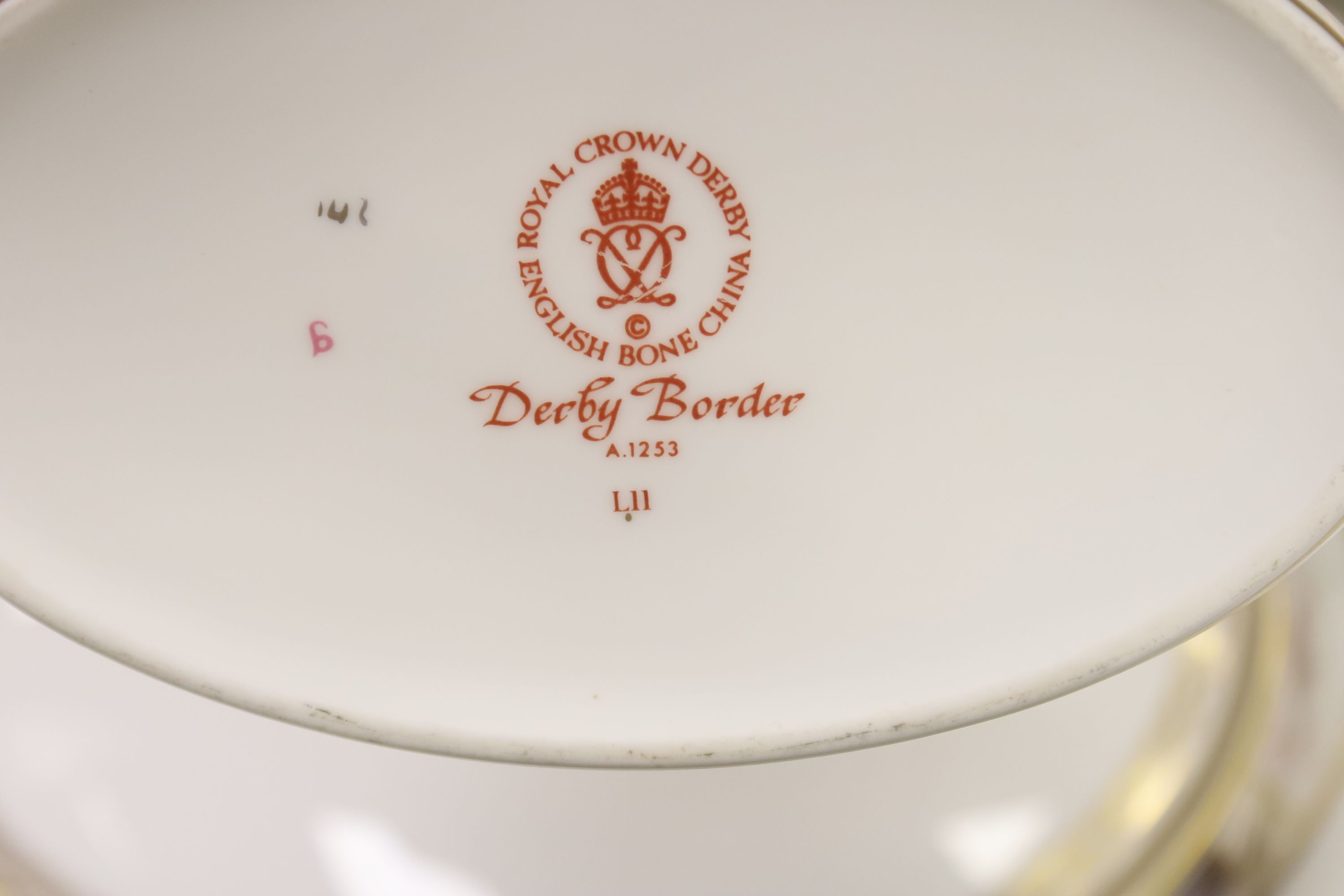 A Royal Crown Derby 'Derby Border' pattern part dinner service